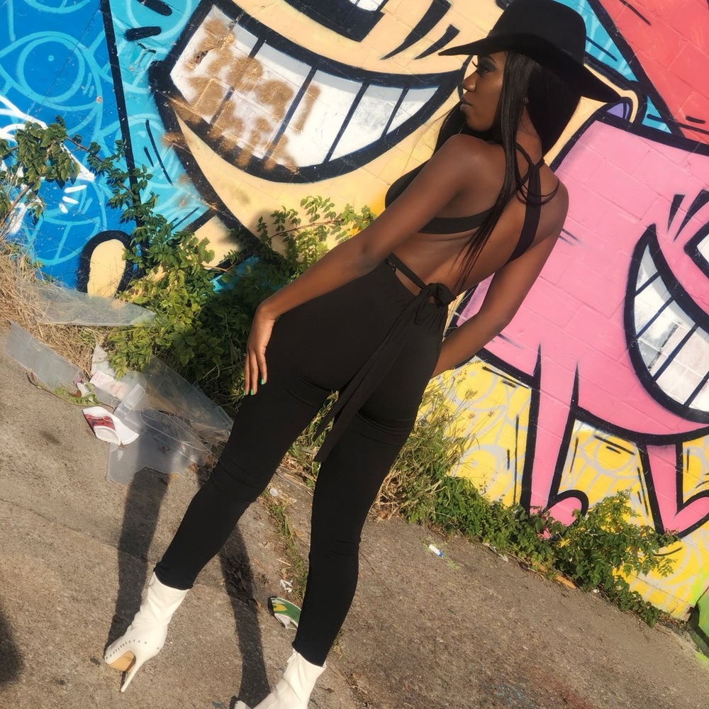 One Piece strap Body suit .